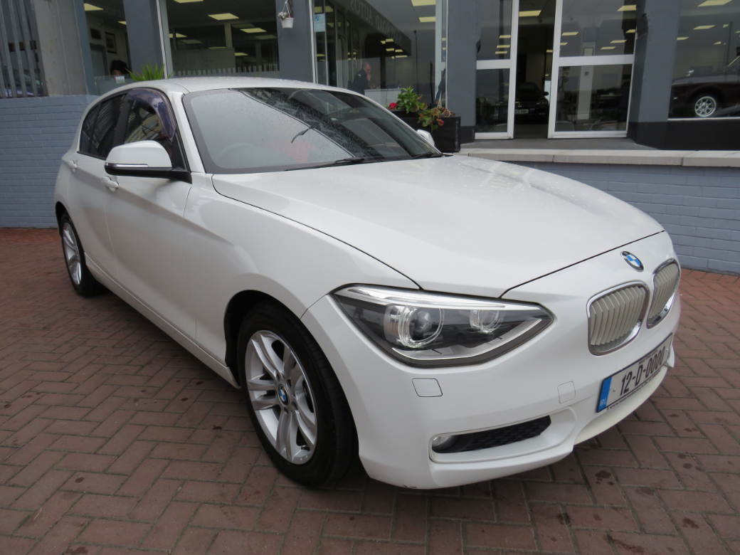 Image for 2012 BMW 1 Series SE 116I PETROL AUTOMATIC // 1 OWNER FROM NEW // FULL SERVICE HISTORY // ALLOYS // BLUETOOTH WITH MEDIA PLAYER // AIR-CON // REVERSE CAMERA // MFSW // NAAS ROAD AUTOS EST 1991 // CALL 01 4564074 